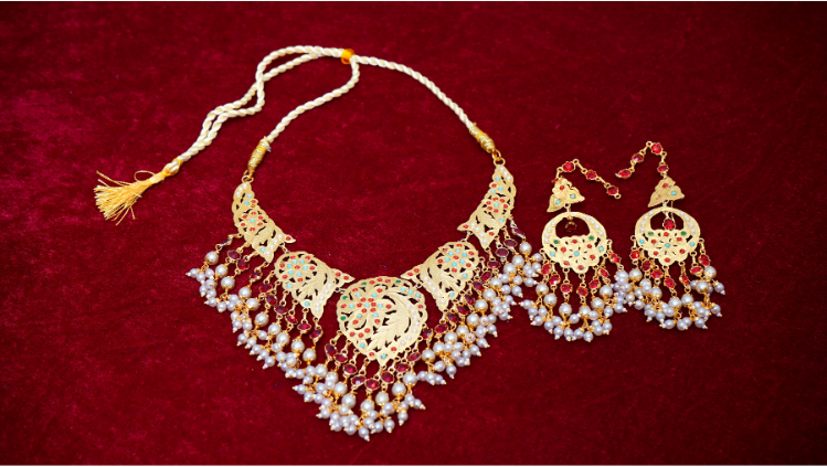 simra gold tone silver necklace and earrings set