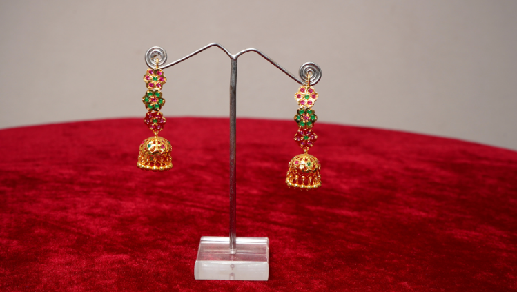 namra gold tone silver earrings